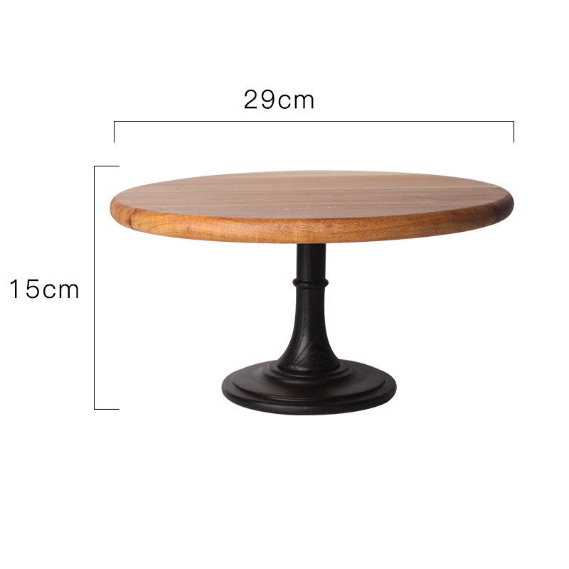 Wooden cake stand by WoodyKitchenware made of solid acacia wood with a 21cm pedestal for serving desserts.