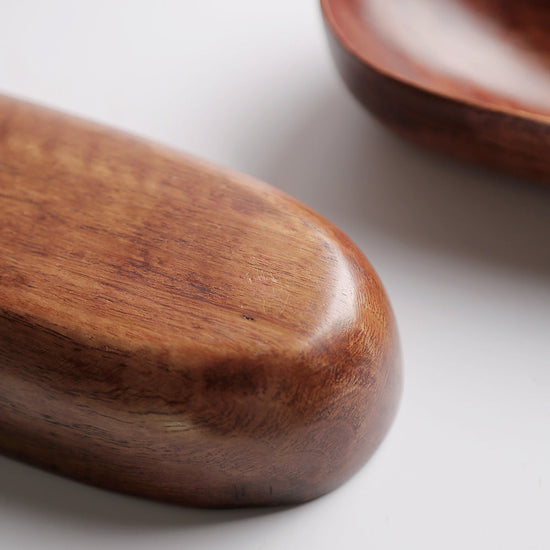 Brown acacia wooden canoe by WoodyKitchenware, featuring natural wood grain for table décor or serving display.