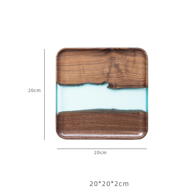 Black walnut river solid timber tea tray by WoodyKitchenware, showcasing a smooth, polished black walnut surface with raised edges.