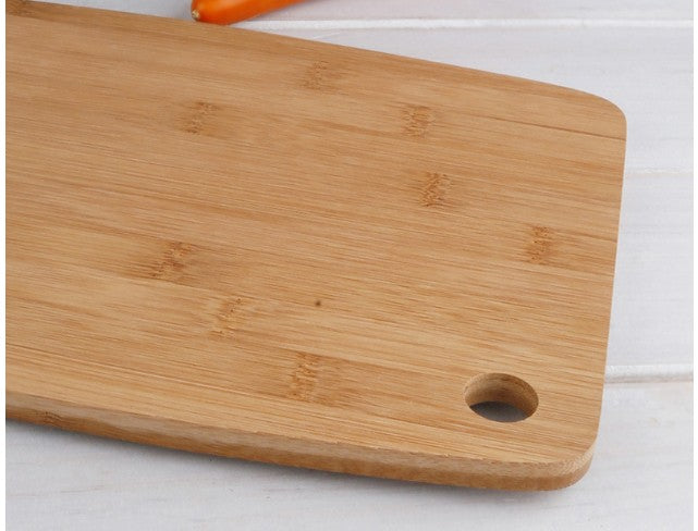Square bamboo cutting board by WoodyKitchenware, natural wood surface ideal for food prep and serving.
