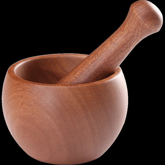 Traditional wooden garlic masher by WoodyKitchenware, Chinese-style kitchen tool with a charming, handcrafted design for efficient garlic crushing.
