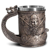 Decorative mug with Viking design and dragon handle on a white background