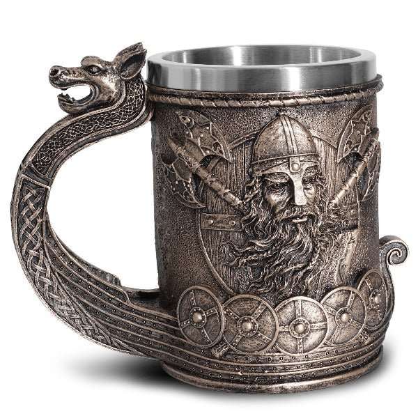 Decorative mug with Viking design and dragon handle on a white background