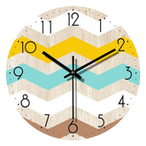 Handcrafted 12-inch wooden wall clock by WoodyKitchenware, featuring a natural solid wood design with black clock hands.