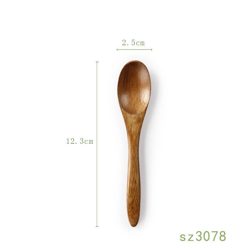Japanese solid wood honey spoon from WoodyKitchenware, featuring a sleek, elegant design and functional shape for honey serving.