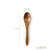 Japanese solid wood honey spoon from WoodyKitchenware, featuring a sleek, elegant design and functional shape for honey serving.