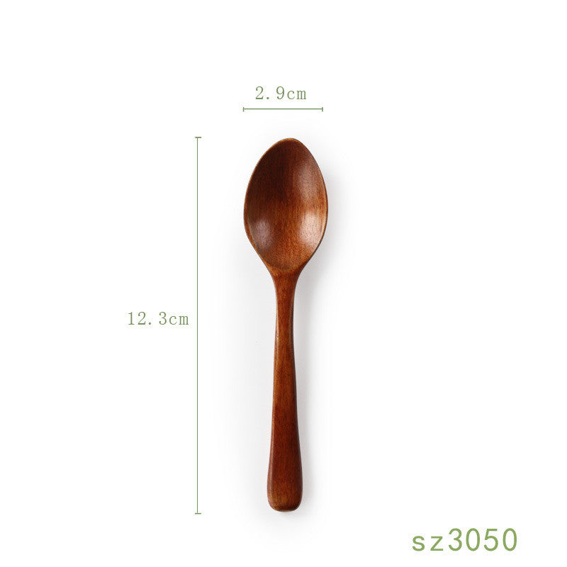 Japanese solid wood honey spoon by WoodyKitchenware, showcasing an elegant, functional design with smooth, natural wood grain.