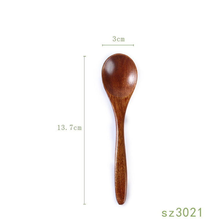 Japanese solid wood honey spoon from WoodyKitchenware, showcasing a smooth, elegant design ideal for honey serving.