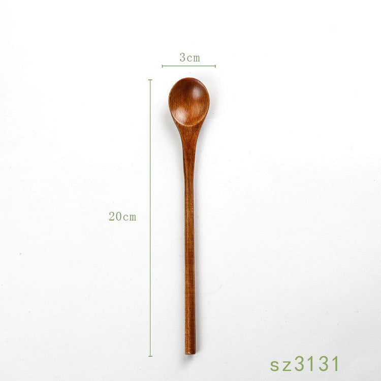 Japanese solid wood honey spoon by WoodyKitchenware, featuring an elegant and functional design for serving honey.