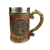 Wooden beer mug by WoodyKitchenware featuring a carved World Tree design, 600ml capacity, made of solid wood for rustic appeal.