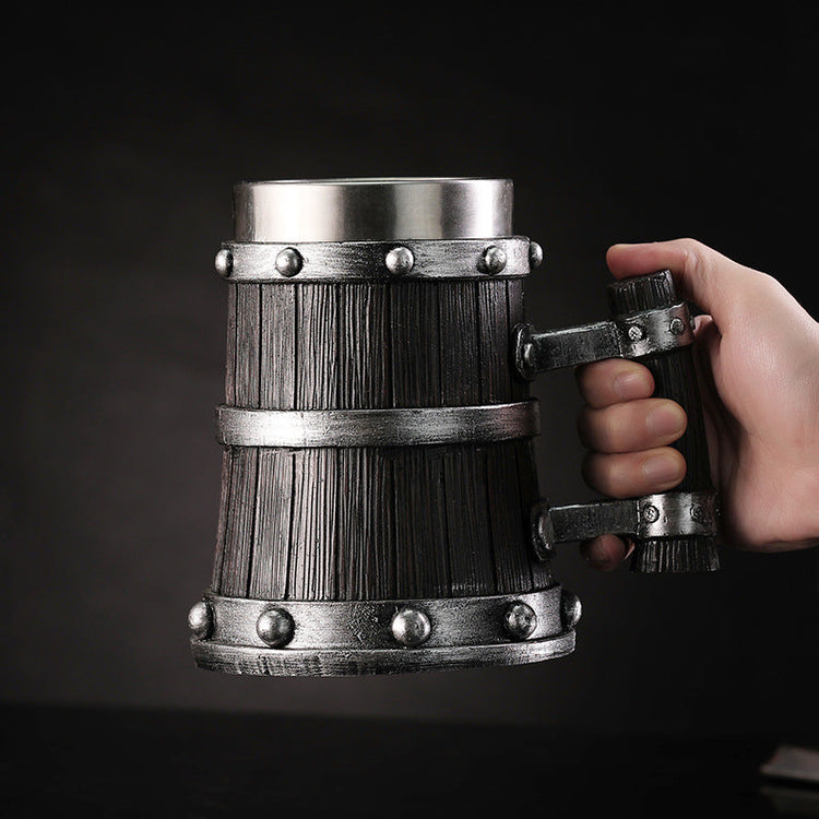 Large handle beer mug by WoodyKitchenware with a monolithic pylon design, handcrafted ceramic vessel for beer drinking.