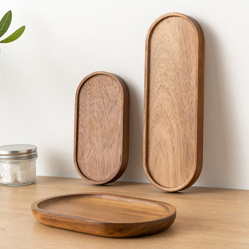 Oval wooden tray by WoodyKitchenware, 17x9x2cm solid timber tray for organizing or serving in a serene workspace.