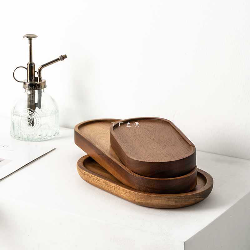 Oval wooden tray by WoodyKitchenware, solid timber with a smooth finish, ideal for organizing workspace or serving.