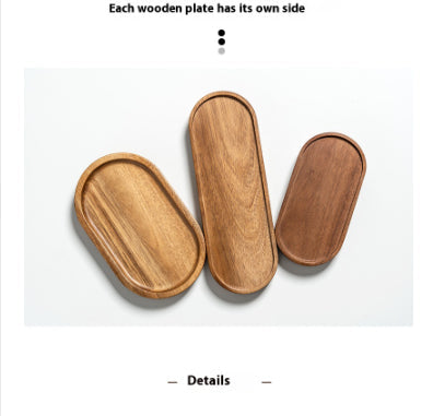 Oval wooden tray by WoodyKitchenware made of solid timber, perfect for organizing or serving in a serene workspace.