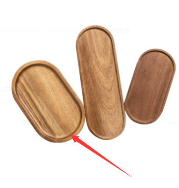 Oval wooden tray by WoodyKitchenware with a smooth finish, perfect for organizing or serving in a serene workspace.