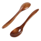 Set of five wooden cooking spoons by WoodyKitchenware, sustainable and stylish kitchen essential for cooking and serving.