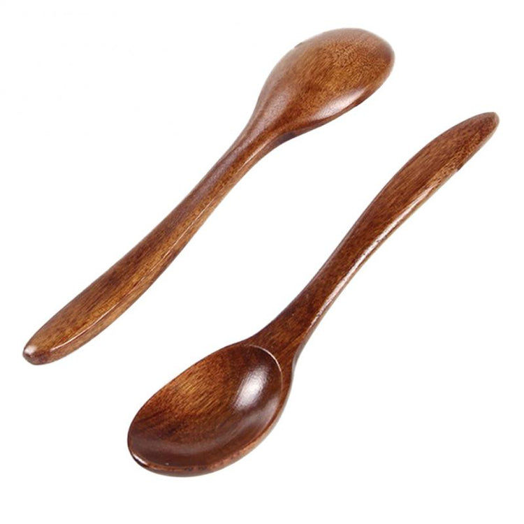 Set of five wooden cooking spoons by WoodyKitchenware, sustainable and stylish kitchen essential for cooking and serving.