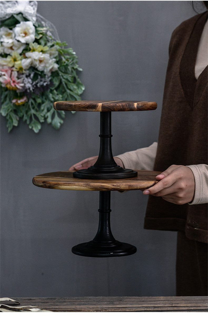 Wooden cake stand by WoodyKitchenware made of solid acacia wood with a 21cm pedestal, perfect for serving desserts elegantly.