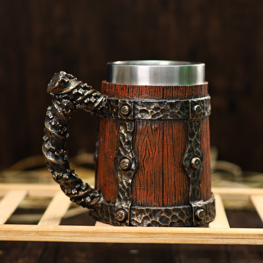 Vintage stainless steel mug by WoodyKitchenware featuring a wooden barrel design and 600ml capacity, perfect for medieval-style drinking.