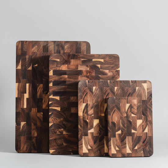 Wooden acacia chopping board from WoodyKitchenware by WoodyKitchenware, 28x28x2.8 inches, showing smooth polished surface and natural wood grain.