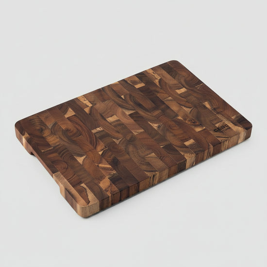 Wooden acacia chopping board from WoodyKitchenware by WoodyKitchenware, with a smooth surface and sturdy build.