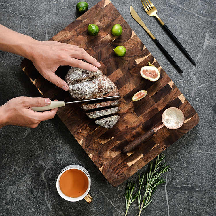 Acacia chopping board by WoodyKitchenware, wooden kitchenware with a smooth surface and sturdy construction.