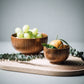 Wooden bowl made from wild jujube timber, handcrafted by WoodyKitchenware, showing the smooth, natural wood grain and rounded shape.