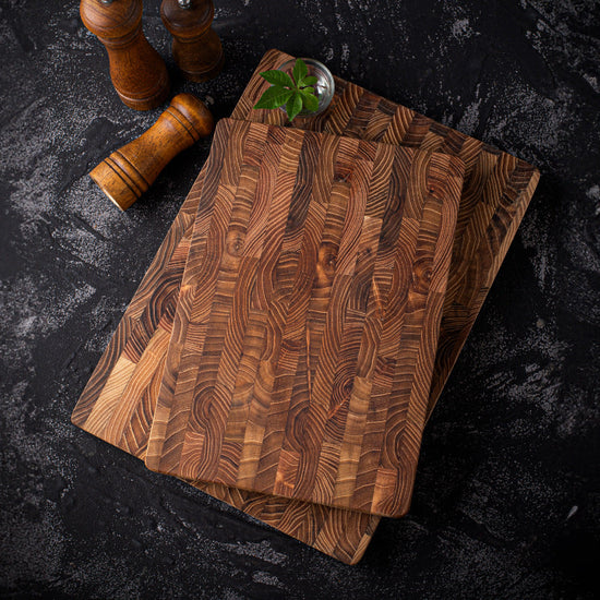 Square solid wood chopping board made of premium teak with smooth surface, ideal for everyday food prep by WoodyKitchenware.