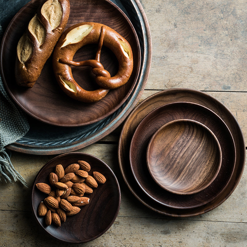 Black Walnut round dish by WoodyKitchenware, elegant serving tray for dried fruits and desserts, with a smooth, natural finish.