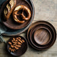 Black Walnut round dish by WoodyKitchenware, elegant serving tray for dried fruits and desserts, with a smooth, natural finish.