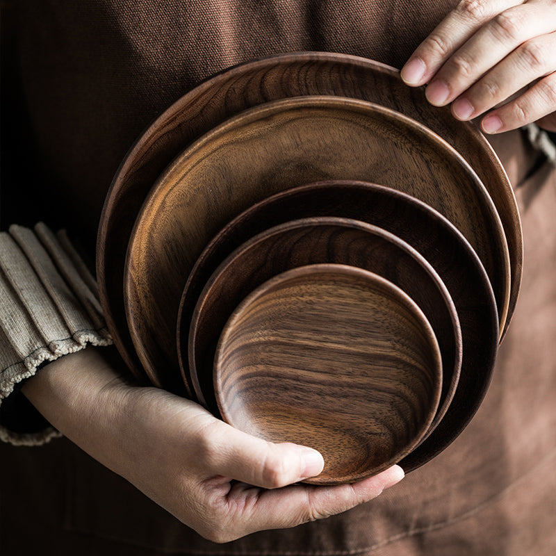Black Walnut Round Dish by WoodyKitchenware, elegant serving tray for dried fruits and desserts, crafted from walnut wood.