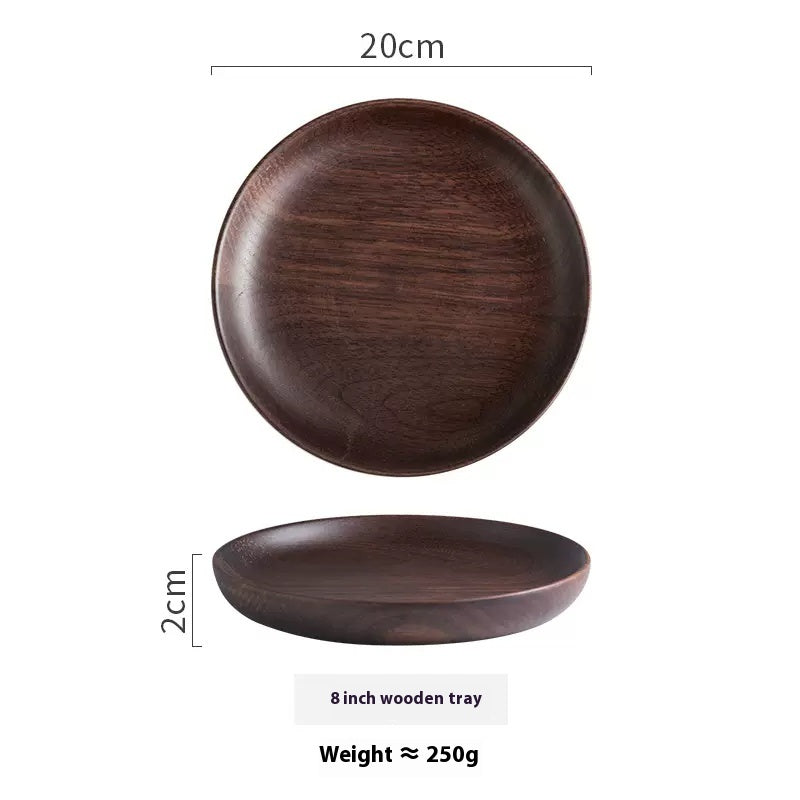 Black Walnut Round Dish by WoodyKitchenware, elegant serving tray for dried fruits and desserts, showcasing smooth wood grain.