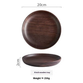 Black Walnut Round Dish by WoodyKitchenware, elegant serving tray for dried fruits and desserts, showcasing smooth wood grain.
