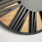 Wooden wall clock with industrial forge design, crafted from solid timber by WoodyKitchenware, suitable for modern home decor.