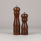 Wooden pepper grinder and spice bottle from WoodyKitchenware, manual ceramic mill with a sleek wooden finish for fresh seasoning.