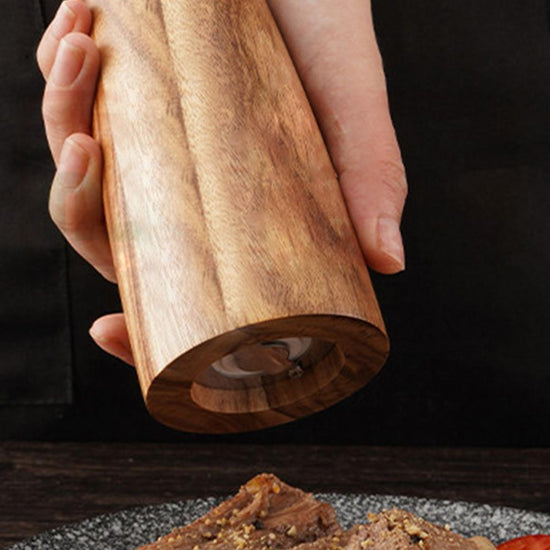 Acacia wood round head spice grinder by WoodyKitchenware with manual ceramic mill for fresh ground spices.