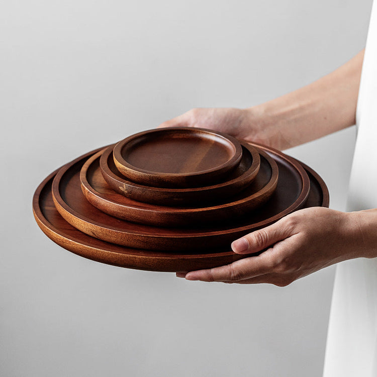 Elegant round wooden Japanese storage cake tray by WoodyKitchenware, showcasing a smooth circular wooden cake stand.