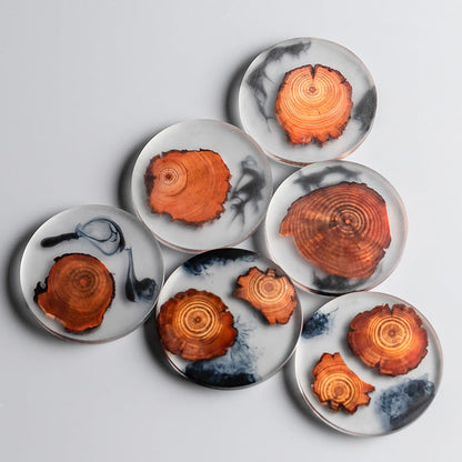Round resin pine coaster set by WoodyKitchenware, heat-resistant teacup mats for protecting surfaces in stylish kitchen decor.