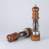 Wooden salt and pepper grinder set by WoodyKitchenware, featuring solid timber mills with a natural finish.
