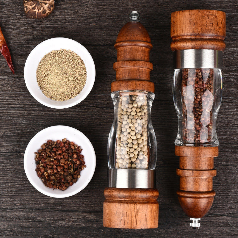 Wooden salt and pepper grinder duo by WoodyKitchenware, showcasing solid timber design and sleek seasoning mill.