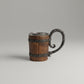 Sculpted charred barrel stein from WoodyKitchenware, The Hearth’s Sentinel, featuring detailed woodgrain and handcrafted design.