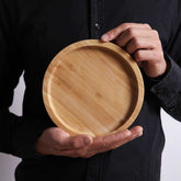 Rectangular bamboo wooden dinner plate tray by WoodyKitchenware, ideal for household serving and food presentation.