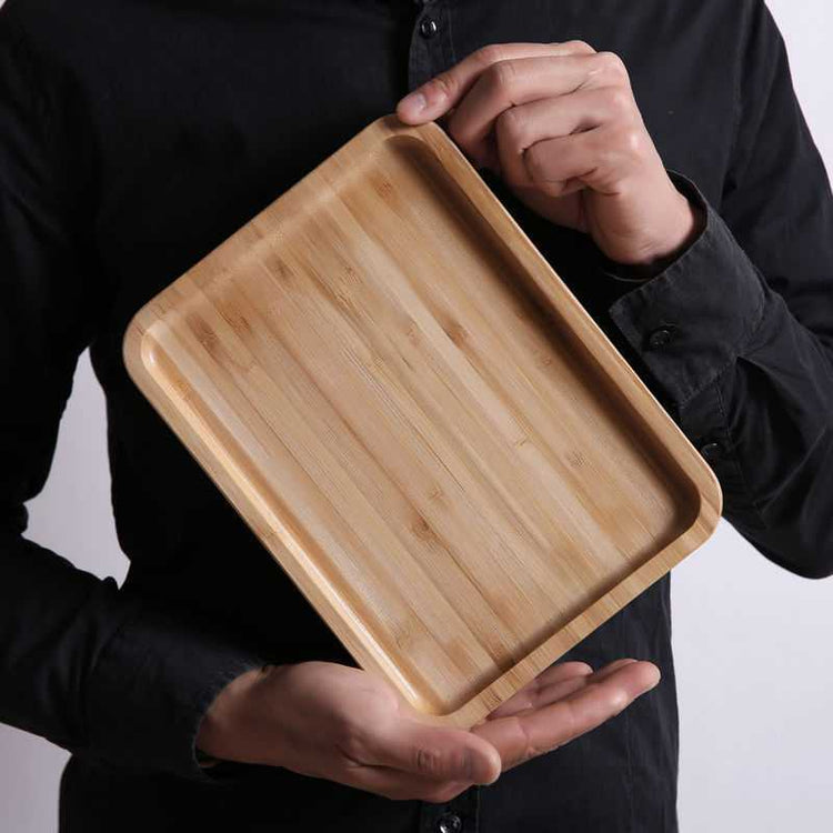 Rectangular bamboo wooden dinner plate tray by WoodyKitchenware, ideal for household serving and presentation.