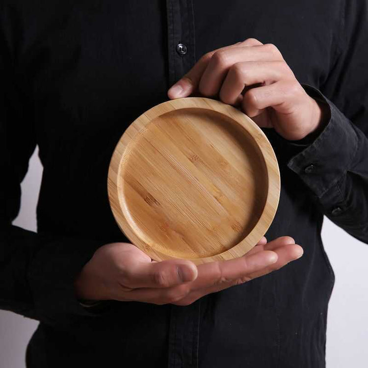 Rectangular bamboo wooden dinner plate tray by WoodyKitchenware, ideal for serving food in a household setting.