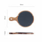 Black wooden pizza dish from WoodyKitchenware, stylish serving plate for pizzas, crafted from natural wood with a sleek finish.