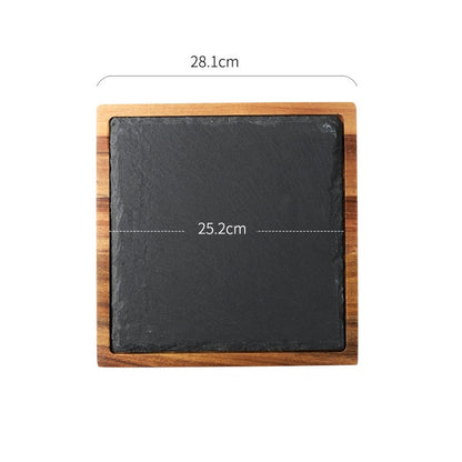 Black wooden pizza dish from WoodyKitchenware, a stylish serving plate for pizza or snacks, crafted from natural wood.