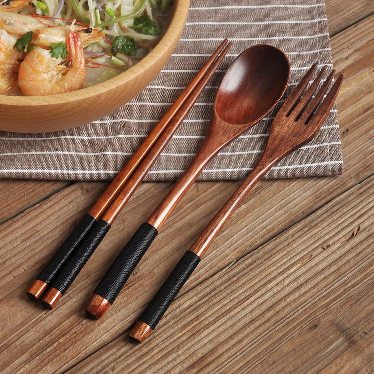 Set of colorful wooden spoons from WoodyKitchenware, eco-friendly Korean-inspired tableware with vibrant, natural wood finishes.