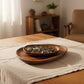 Handcrafted black walnut serving tray from WoodyKitchenware, ideal for sushi, tea, fruits, and snacks, with an irregular shape.