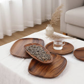 Handcrafted black walnut serving tray by WoodyKitchenware, irregular shape ideal for sushi, tea, fruits, and snacks.