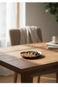 Handcrafted black walnut serving tray with irregular edges, perfect for sushi, fruit, tea, and snacks from WoodyKitchenware.
